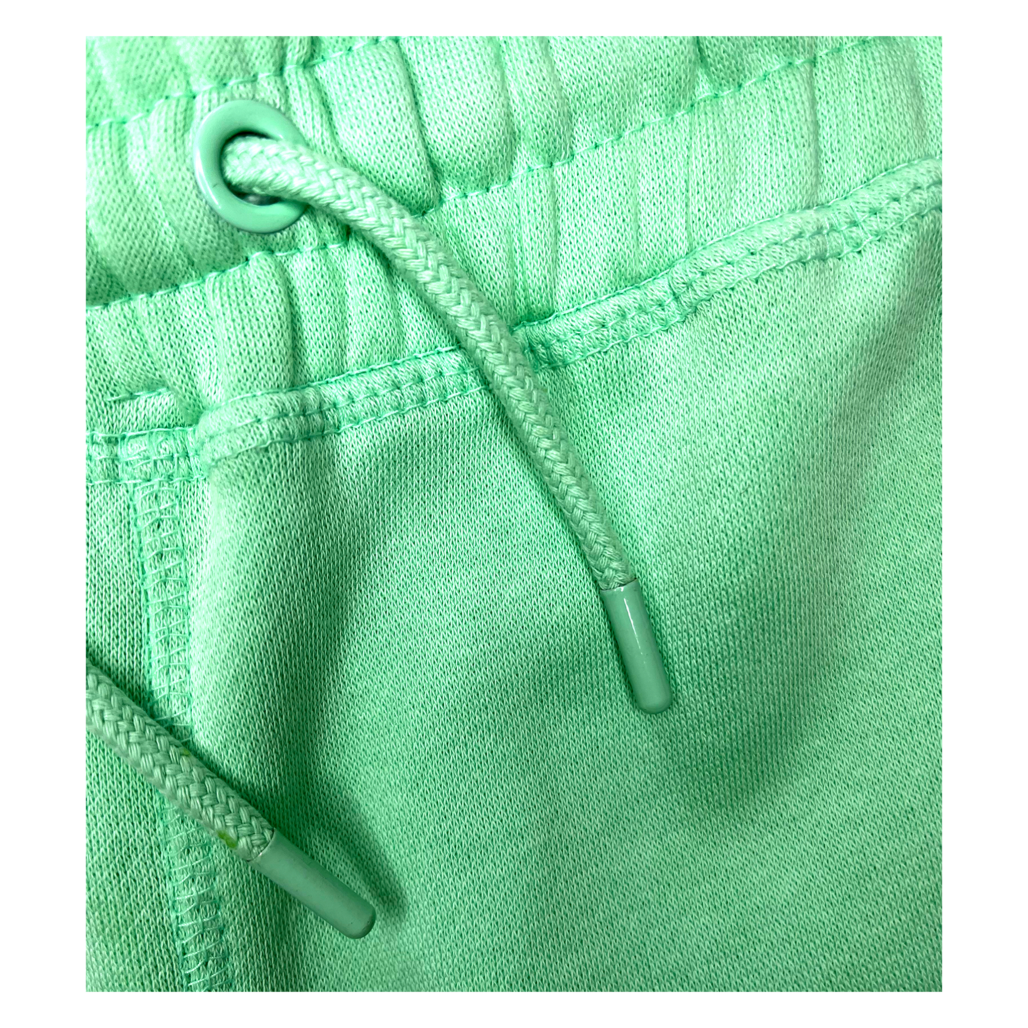 Metal eyelets and tips for drawstring of Mint Hustle Shorts